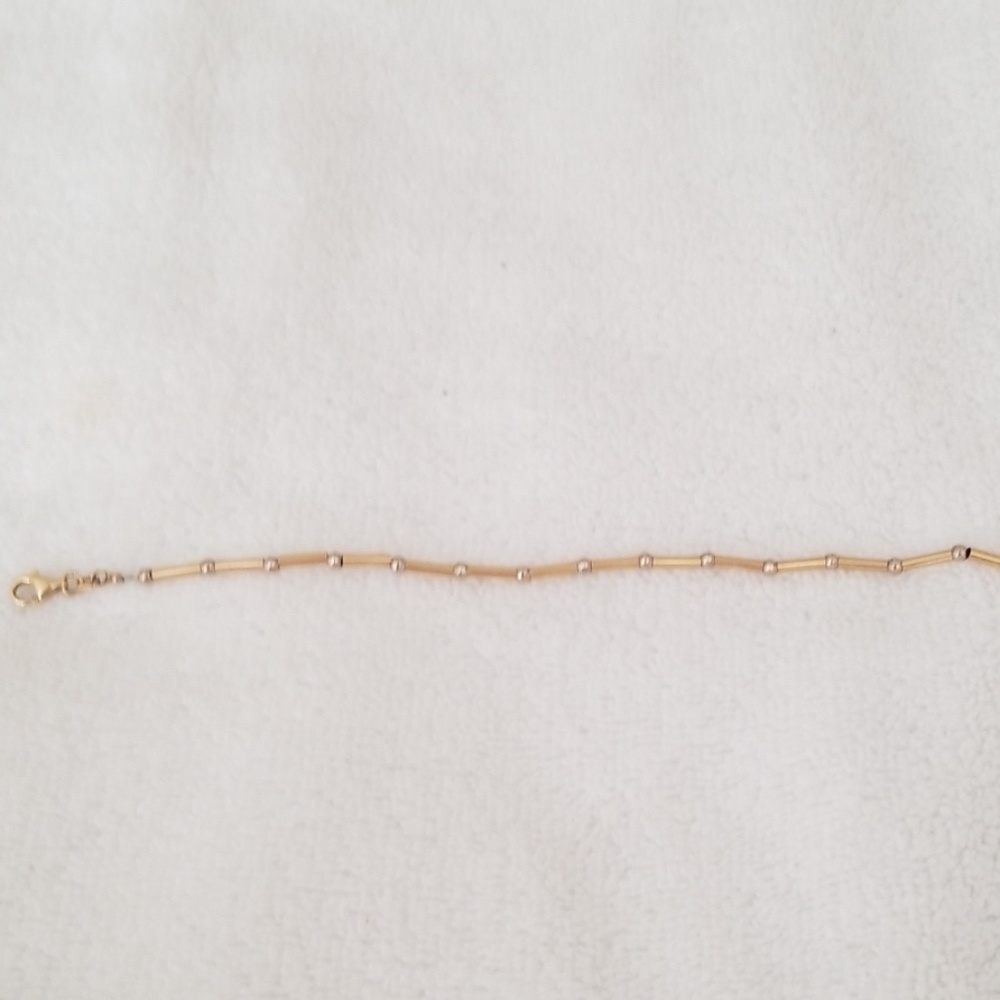 7in 14k gold bracelet with white gold beads